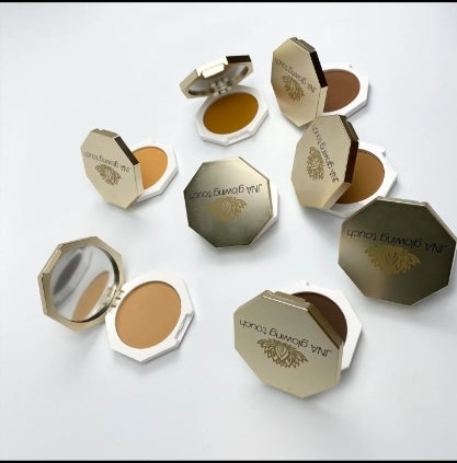 Various color options of JNA Glowing Touch golden compact powder foundation.