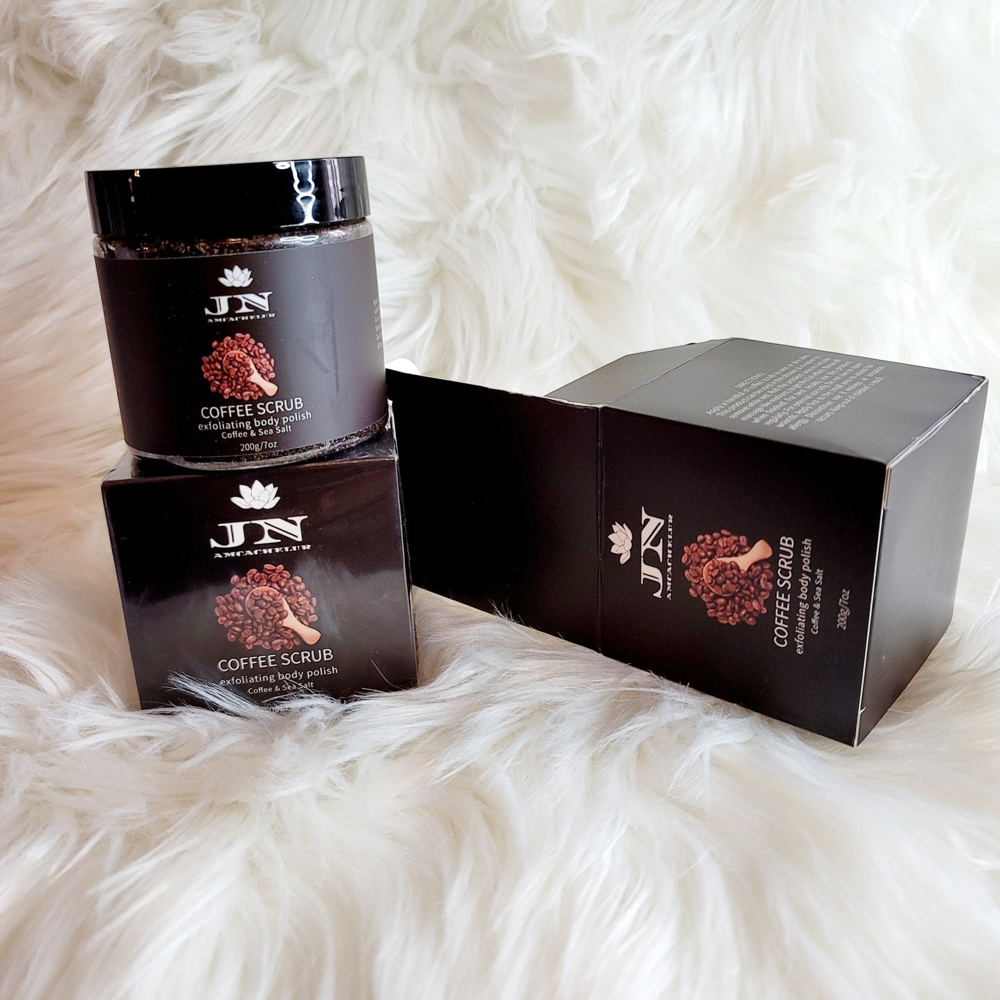 JNA coffee body scrub with essential oils and cream.