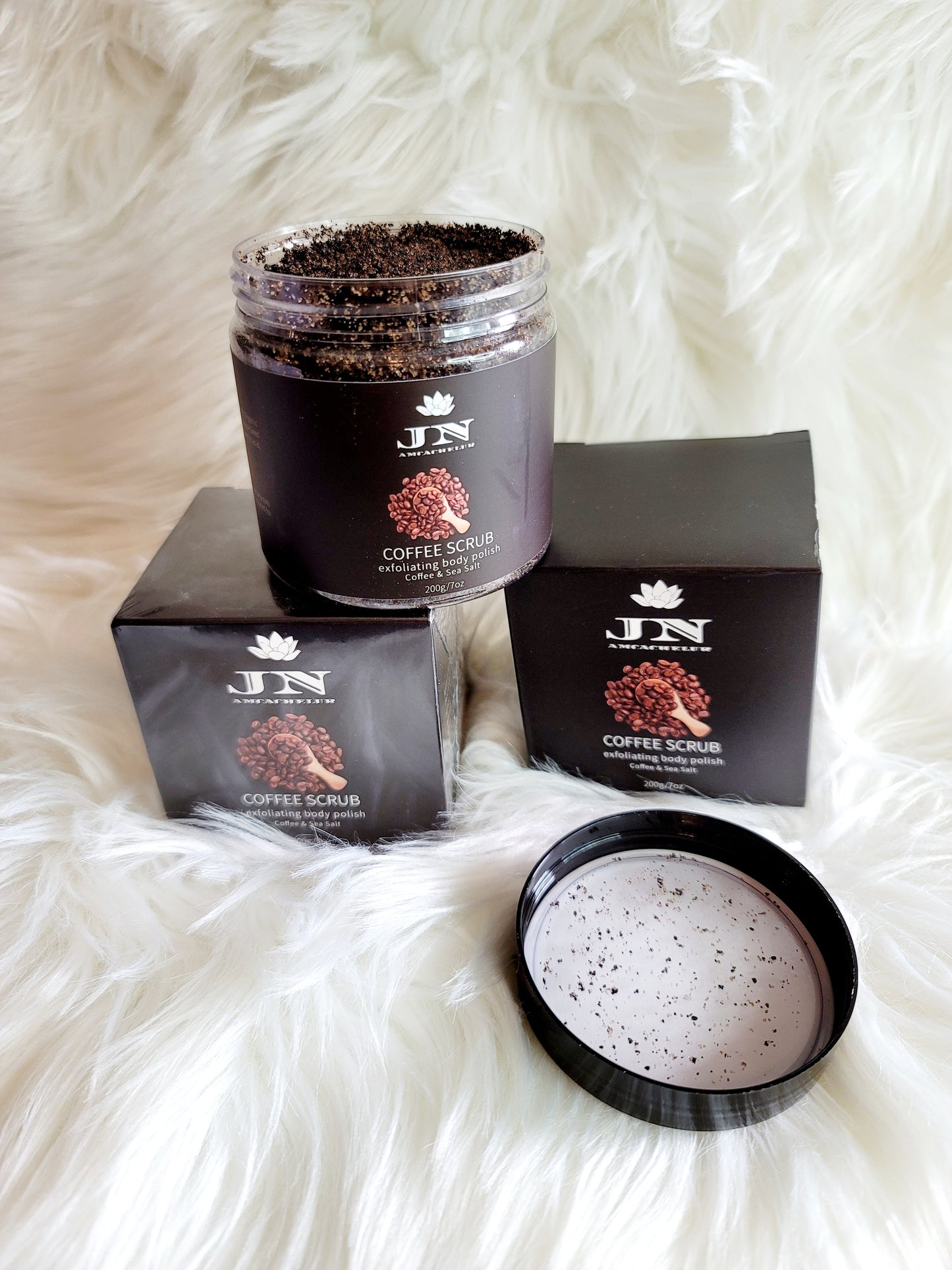 JNA coffee body scrub with essential oils and cream.