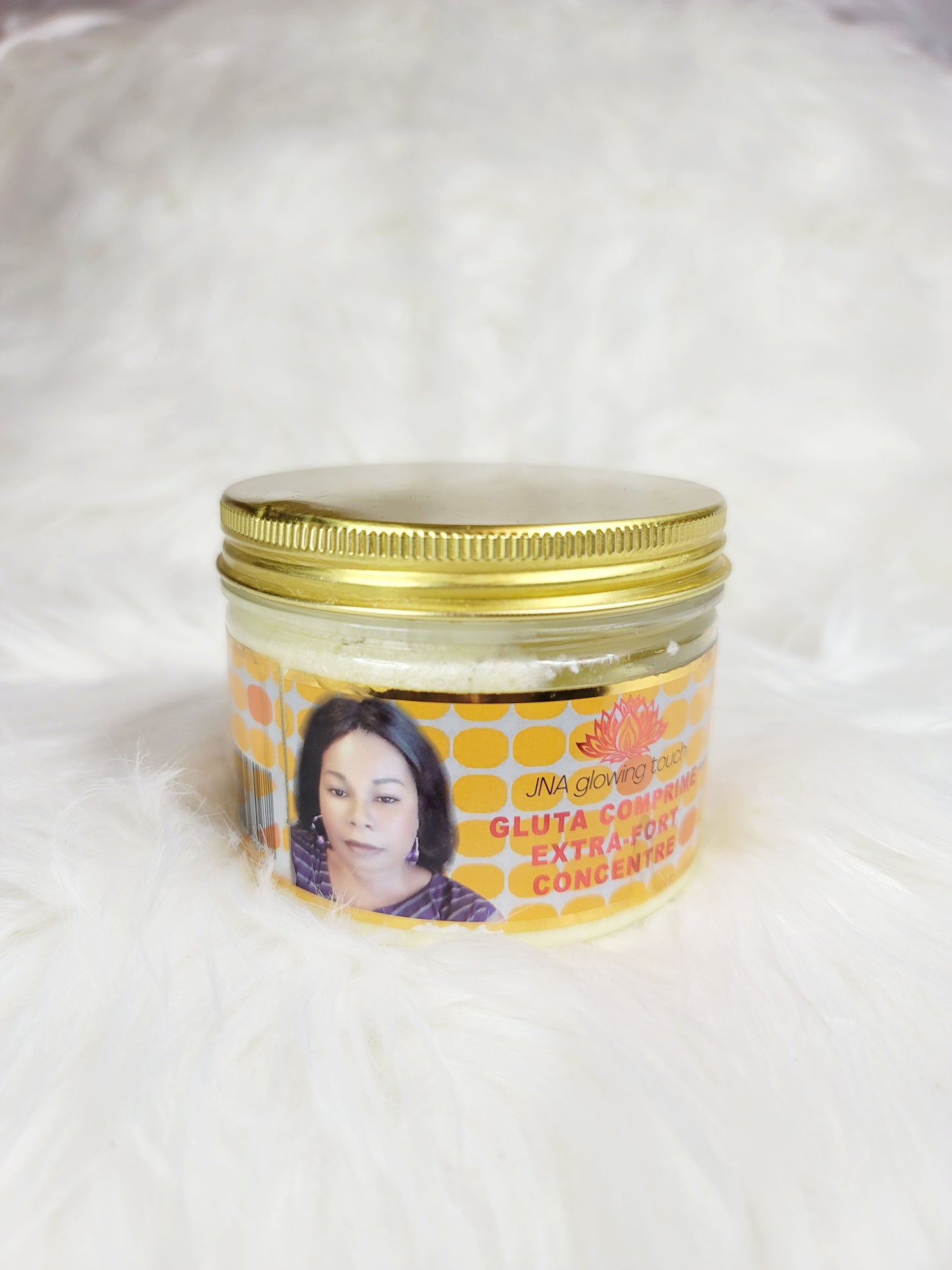 A jar of JNA glowing touch Gluta Extra-fort body soap .