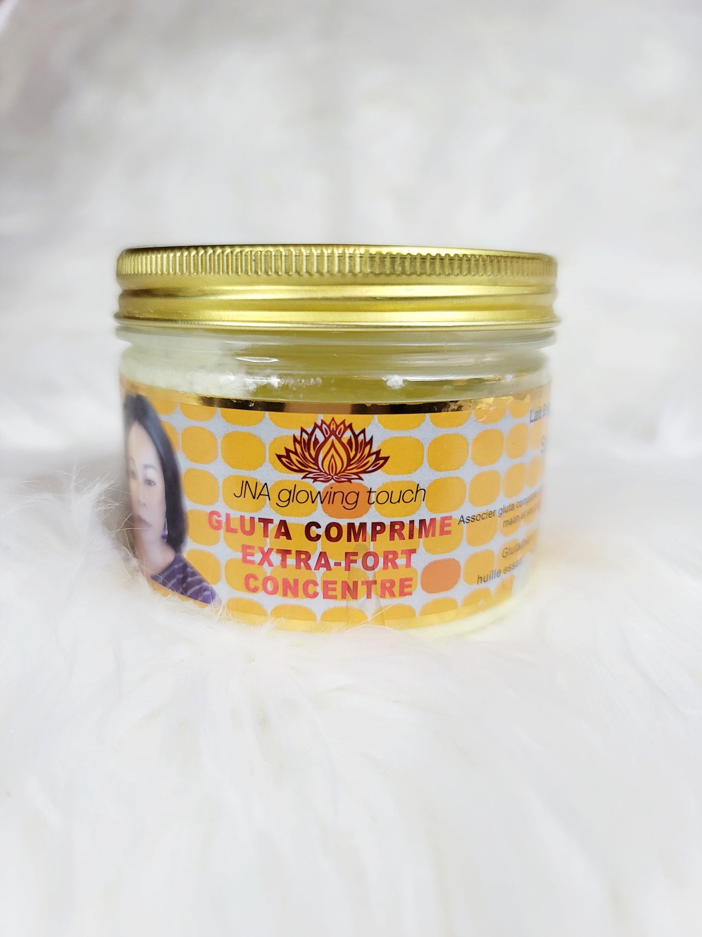 A jar of JNA glowing touch Gluta Extra-fort body soap .