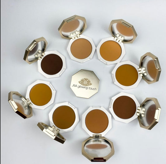 Various color options of JNA Glowing Touch golden compact powder foundation.