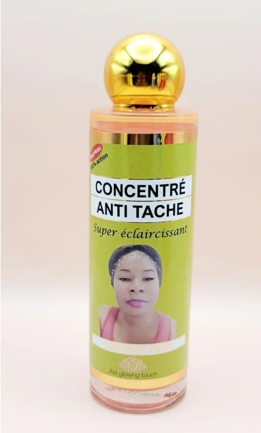 JNA glowing touch Fruit Acid Anti-Tache Serum bottle.