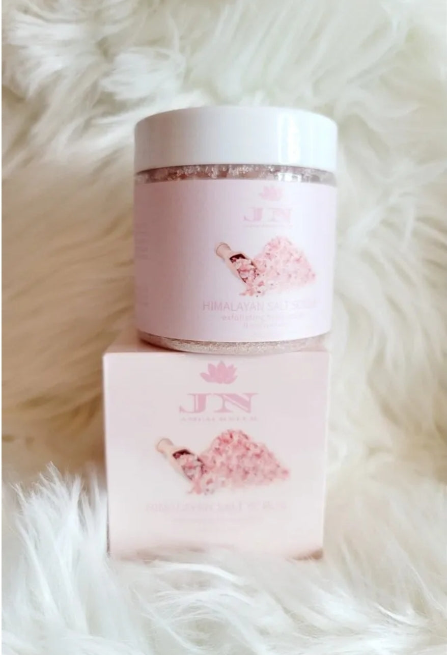 JNA Himalayan salt body scrub in pink packaging.